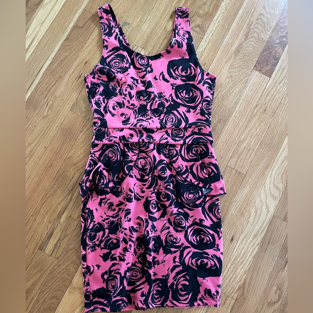 Short tight pink with black roses dress